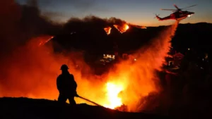 California Wildfires Rage as Hot Winds Send Flames Toward Coastal Homes